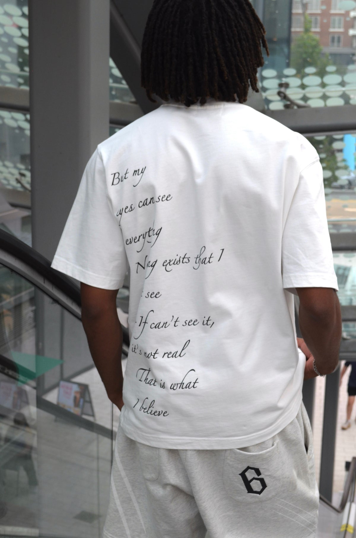 Close-up of Ulquiorra shirt back monologue print, Solace Studios Espada collection