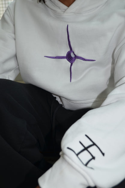 Closeup of Hogyoku embroidery on chest of Aizen hoodie by Solace Studios
