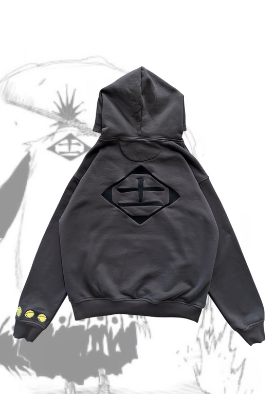 Black front flat lay of Kenpachi Zaraki hoodie with Kenpachi background by Solace Studios
