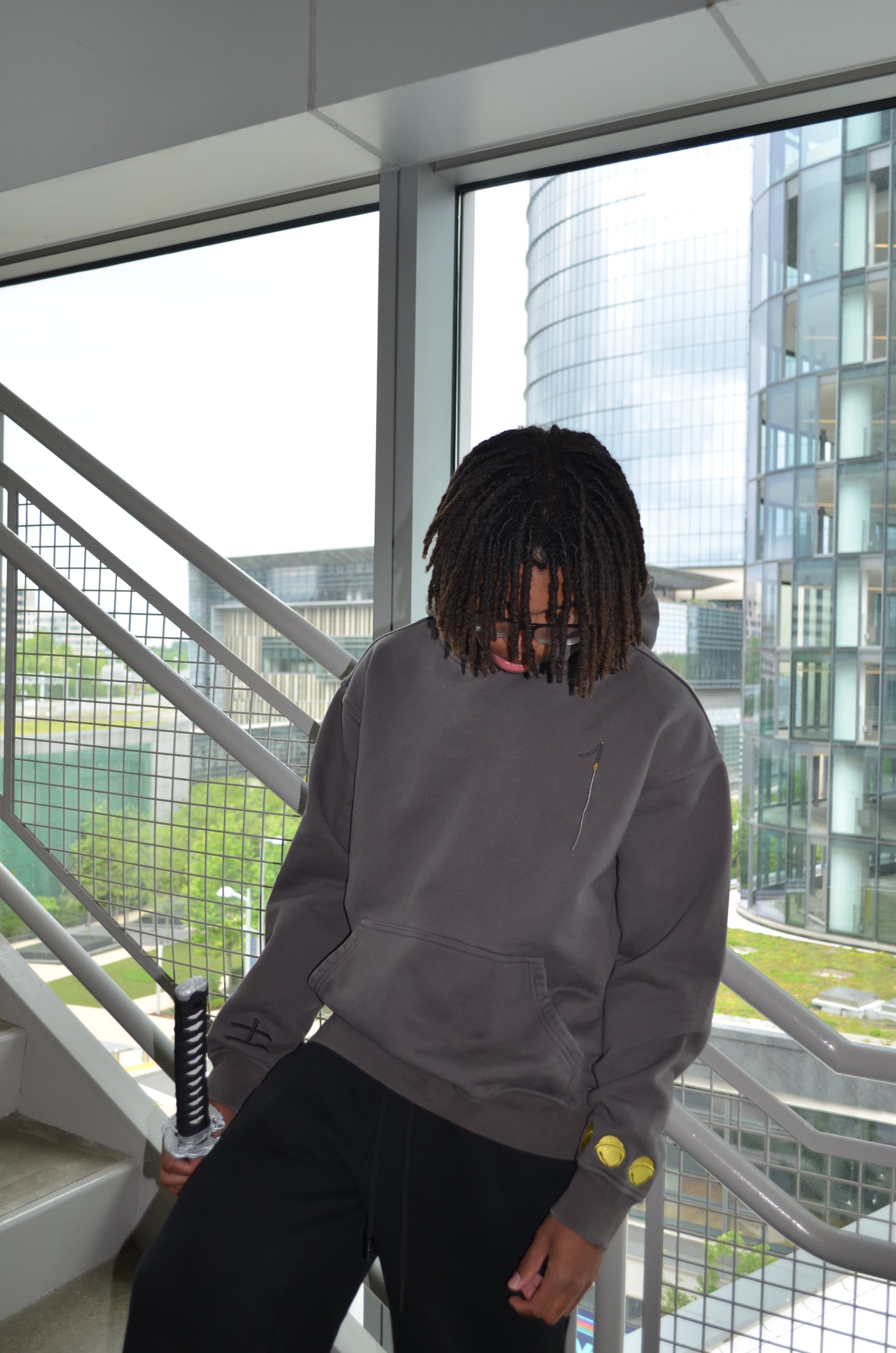 Front view of Kenpachi Zaraki hoodie charcoal colorway by Solace Studios